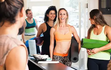 Why your yoga studio’s POS system should integrate with scheduling software